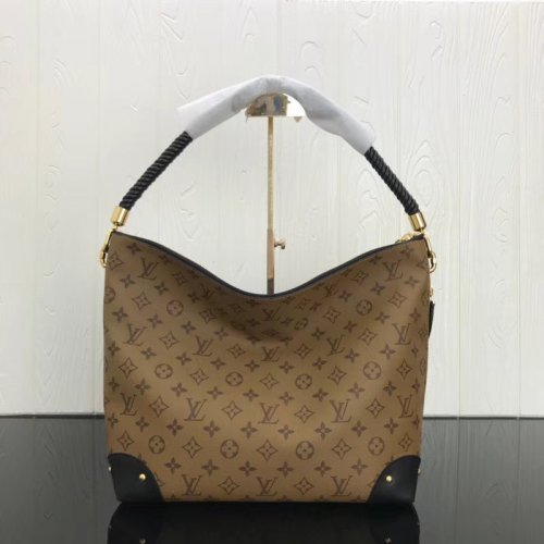 Louis Vuitton Monogram Reverse canvas Triangle Softy M44130