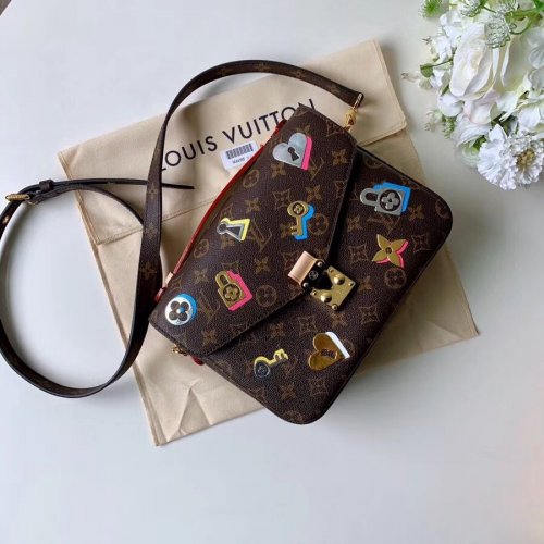 Louis Vuitton Monogram Canvas Love Lock Pochette Métis M44366 Louis Vuitton Monogram Canvas Love Lock Pochette Métis M44366
