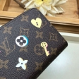 Louis Vuitton Monogram Canvas Love Lock Zippy Wallet M64116