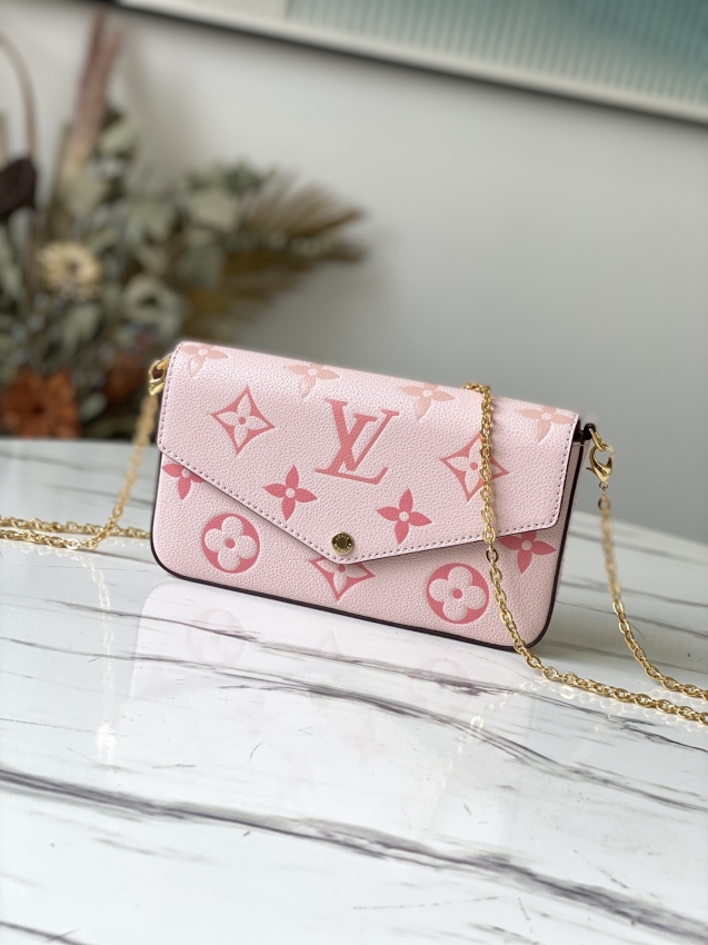 Louis Vuitton Felicie Pochette Monogram Empreinte Leather in Pink - Small Leather Goods M80498PI