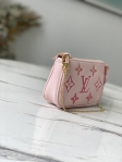 Louis Vuitton Mini Pochette Accessoires Monogram Empreinte Leather in Rose - M80501