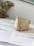 Louis Vuitton Mini Pochette Accessoires Monogram Empreinte Leather in Beige - M80501BE
