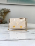 Louis Vuitton Mini Pochette Accessoires Monogram Empreinte Leather in Beige - M80501BE