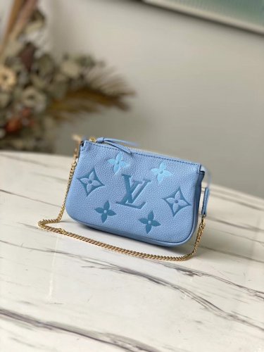 Louis Vuitton Mini Pochette Accessoires Monogram Empreinte Leather in Blue - M80501BL