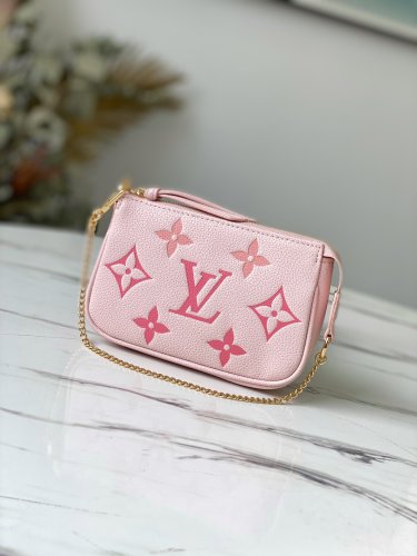 Louis Vuitton Mini Pochette Accessoires Monogram Empreinte Leather in Rose - M80501