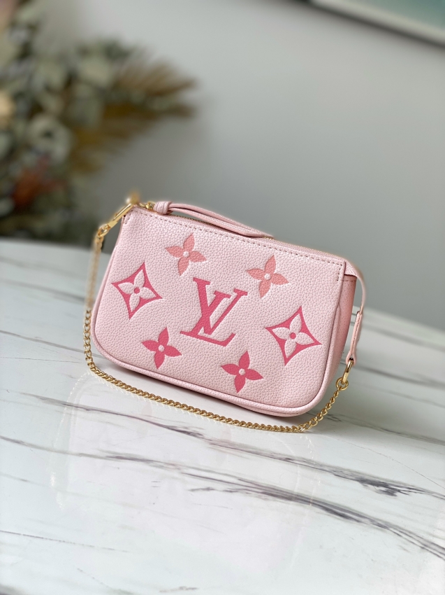 Louis Vuitton Mini Pochette Accessoires Monogram Empreinte Leather in Rose - M80501