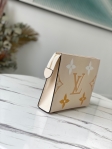 Louis Vuitton Toiletry Pouch 26 Monogram Empreinte Leather in Beige - Travel M80504