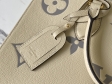 Louis Vuitton OnTheGo MM Bicolor Monogram Empreinte Leather in Beige - Handbags M45494