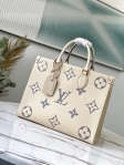 Louis Vuitton OnTheGo MM Bicolor Monogram Empreinte Leather in Beige - Handbags M45494