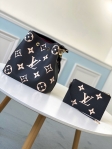 Louis Vuitton NeoNoe MM Bicolor Monogram Empreinte Leather in Black - Handbags M45497