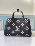 Louis Vuitton Montaigne MM Bicolor Monogram Empreinte Leather in Black - Handbags M45499
