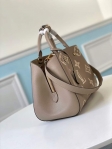 Louis Vuitton Montaigne MM Bicolor Monogram Empreinte Leather in Grey - Handbags M45499