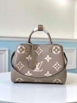 Louis Vuitton Montaigne MM Bicolor Monogram Empreinte Leather in Grey - Handbags M45499