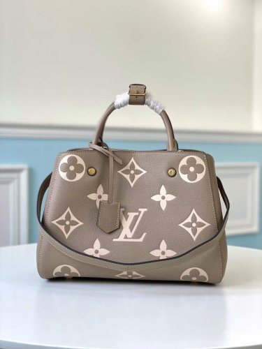 Louis Vuitton Montaigne MM Bicolor Monogram Empreinte Leather in Grey - Handbags M45499