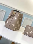 Louis Vuitton NeoNoe MM Bicolor Monogram Empreinte Leather in Grey - Handbags M45555