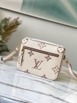Louis Vuitton Pochette Metis Bicolor Monogram Empreinte Leather in Grey - Handbags M45596