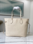 Louis Vuitton Neverfull MM Monogram Empreinte Leather in Cream - Handbags M45684