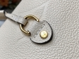 Louis Vuitton Neverfull MM Monogram Empreinte Leather in Cream - Handbags M45684