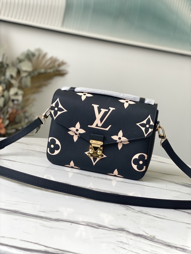 Louis Vuitton Pochette Metis Bicolor Monogram Empreinte Leather in Black - Handbags M45773