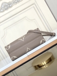 Louis Vuitton Onthego PM Bicolor Monogram Empreinte Leather in Grey - Handbags M45779