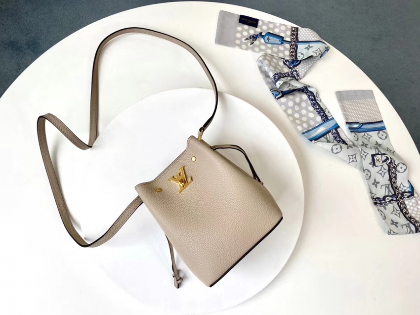 Louis Vuitton Grained calf leather NANO LOCKME BUCKET M69205 Greige