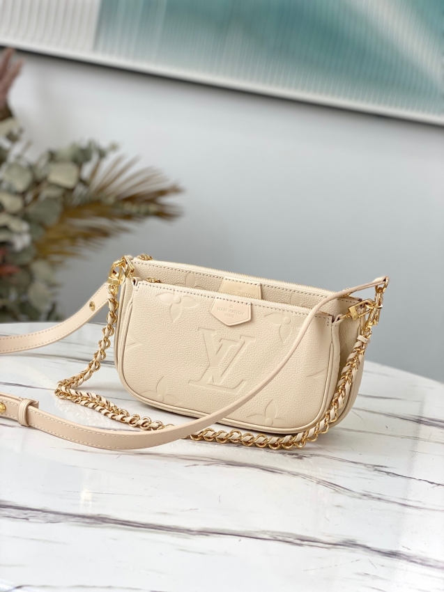 Louis Vuitton Multi Pochette Accessoires Monogram Empreinte Leather in Beige - Handbags M80447