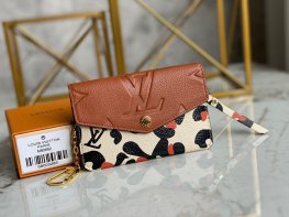 Louis Vuitton Key Pouch Monogram Empreinte Leather in Brown - Small Leather Goods M80692