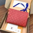 Louis Vuitton Pochette Toilette 26 Monogram Empreinte Leather in Red - Travel M45666