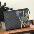 Louis Vuitton Damier Cobalt canvas Pochette Voyage MM Palm Tree N63510
