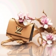 Louis Vuitton Twist MM Epi Leather in Caramel - Women - Handbags M51884