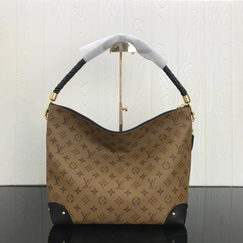 Louis Vuitton Monogram Reverse canvas Triangle Softy M44130