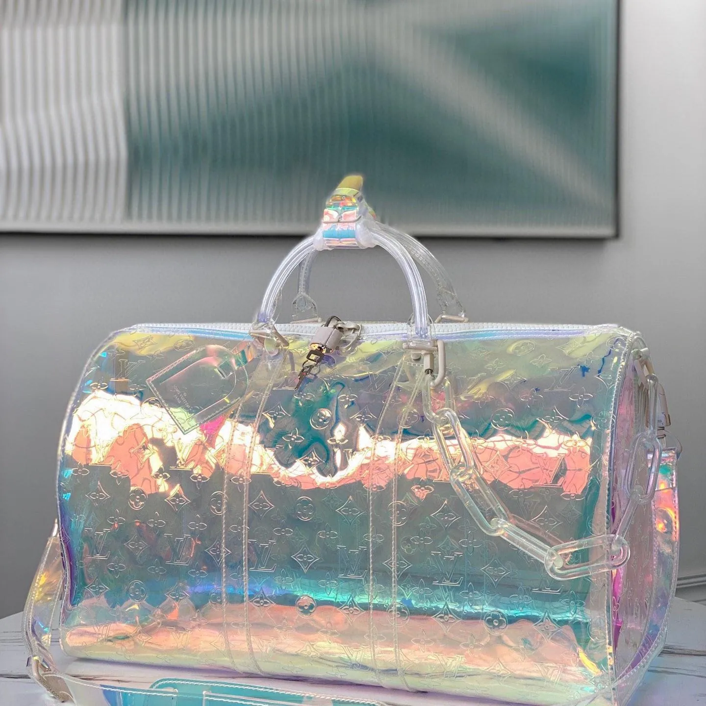 Louis Vuitton Monogram-embossed PVC Keepall Bandouliere 50CM M53271